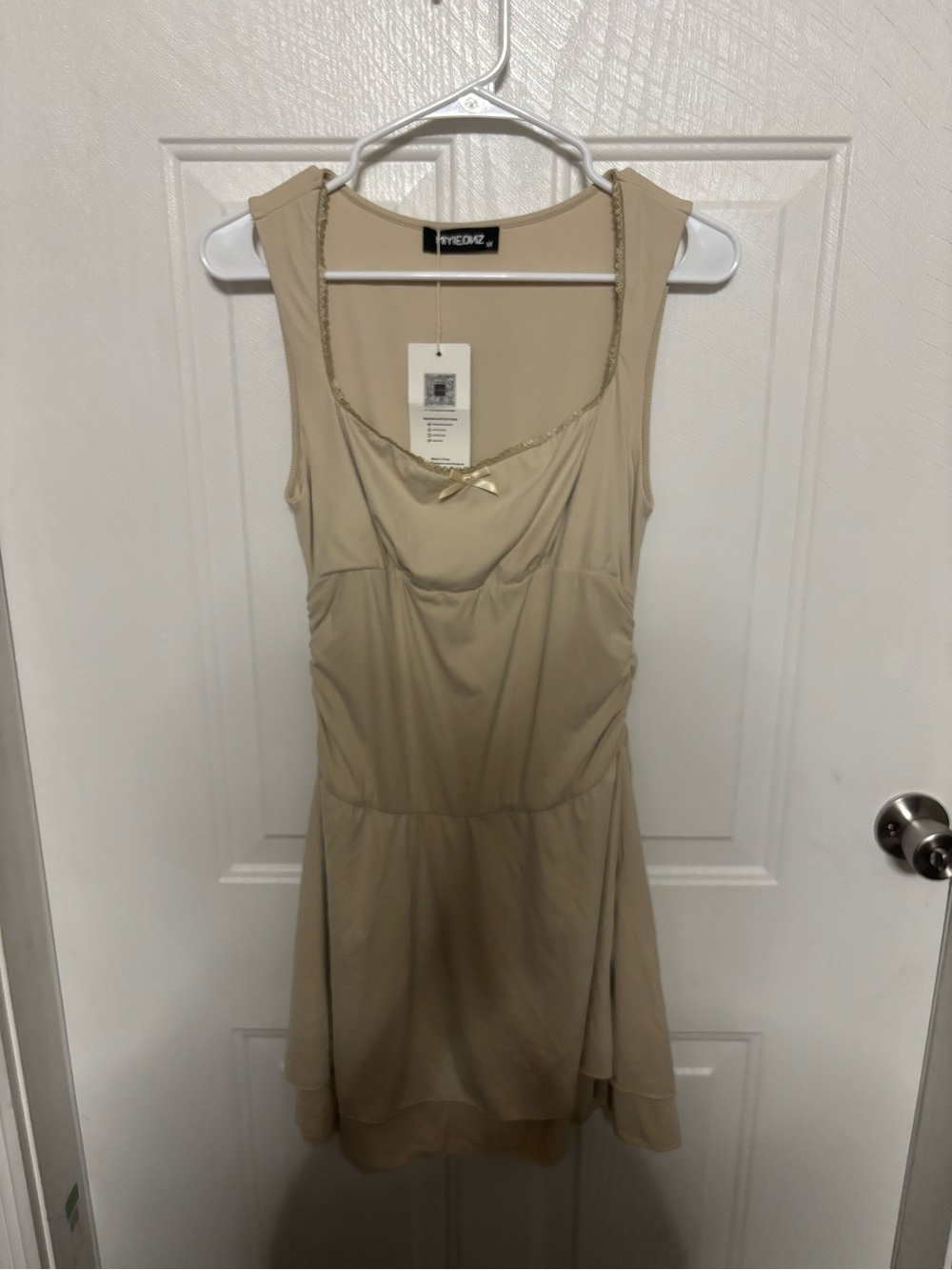 Sleeveless Beige Mini Dress with Gold Trim